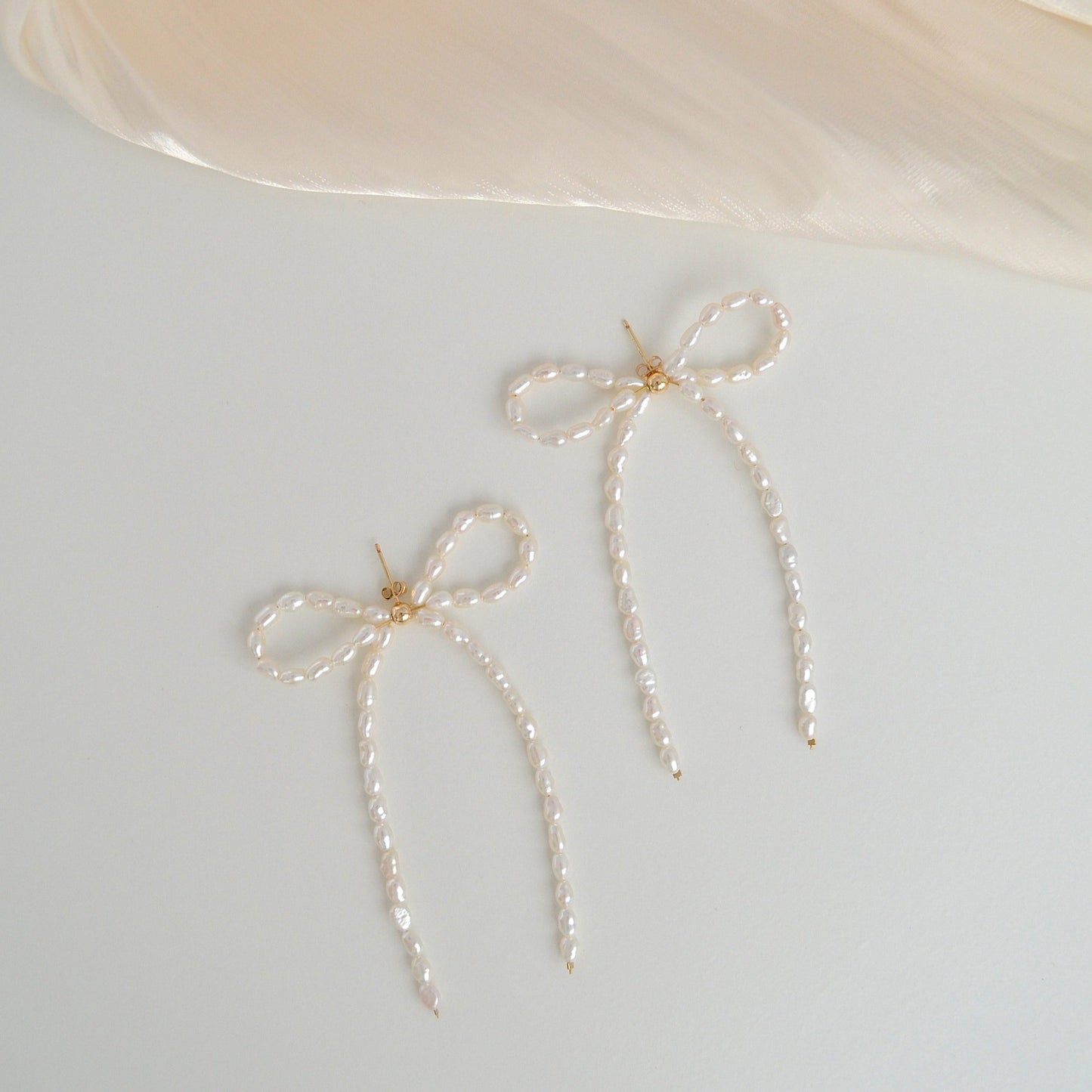 Large Pearl Bow Stud Earrings